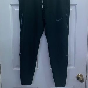 COPY - Nike Men Swift Slim Fit Running Black Pant…